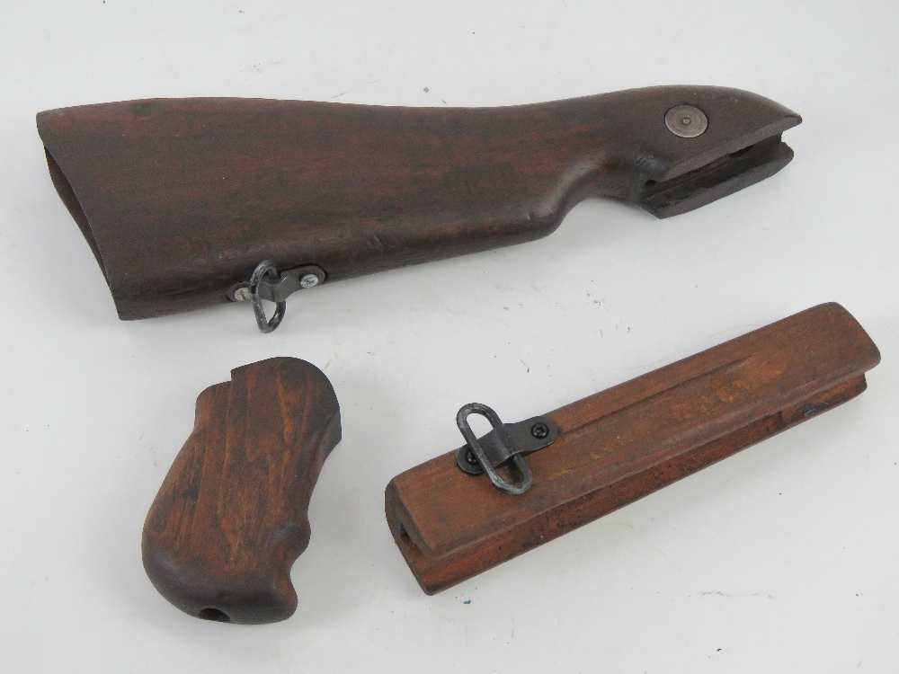 A WWII Thompson woodwork set including stock, pistol grip and foregrip.