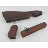 A WWII Thompson woodwork set including stock, pistol grip and foregrip.