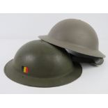 A Belgium helmet having liner and chin strap , together with a WWII allied Brodie helmet, size 56.