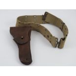 A WWII Colt 1911 holster and belt.