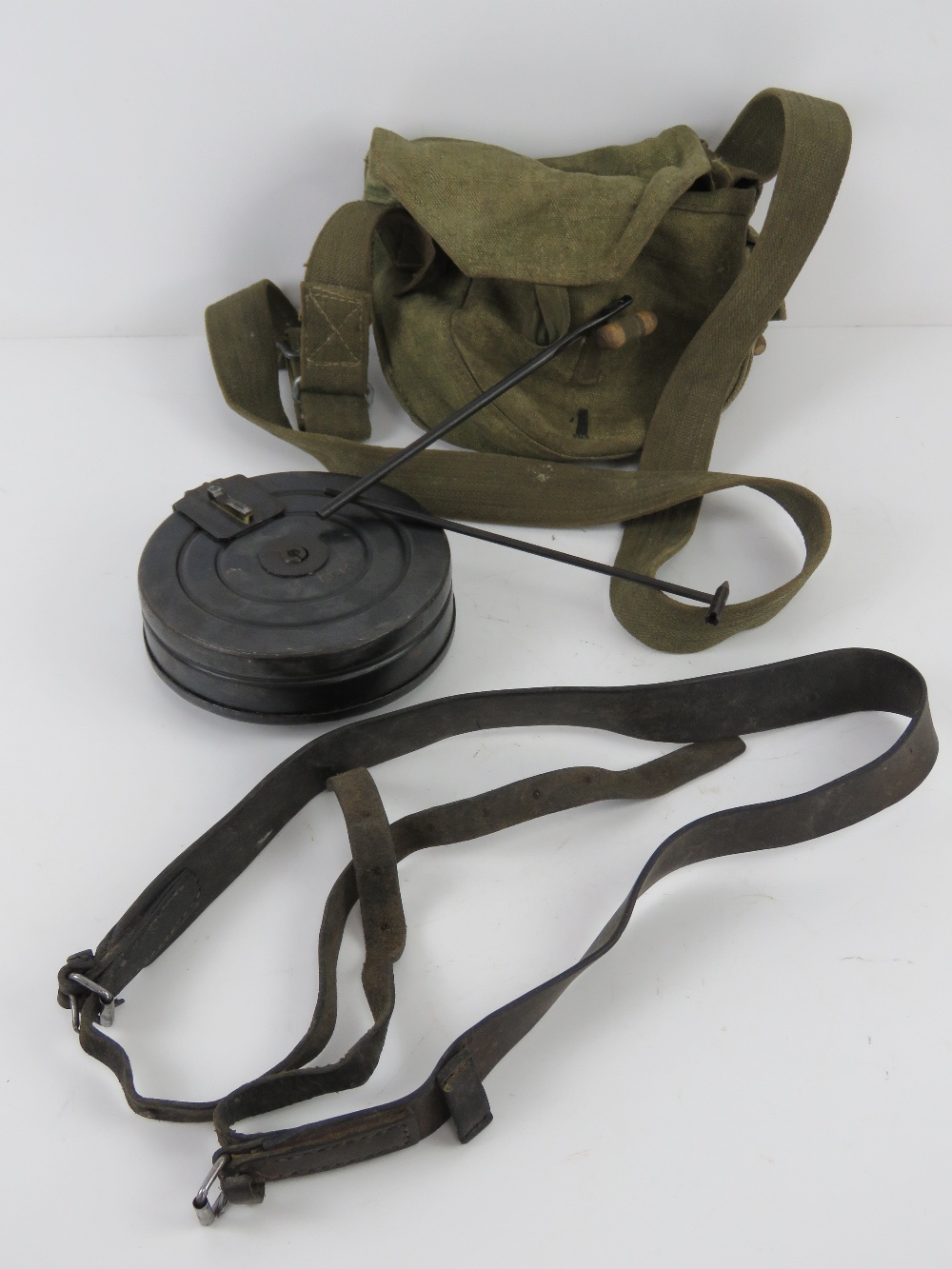 A WWII PPSH-41 leather sling, with magazine, magazine pouch and cleaning rod.