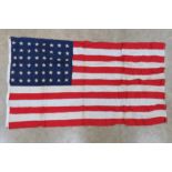 A US flag having 48 stars upon, sewn fabric construction, printed stars, 3' x 5', marked Premier.