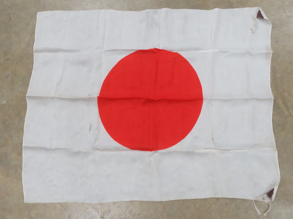 A WWII Japanese Red Rising Sun flag measuring 87 x 72cm.