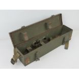 A WWII T16 carrying case with fittings inside.