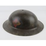 A reproduction WWII British South Nottinghamshire Hussars helmet.