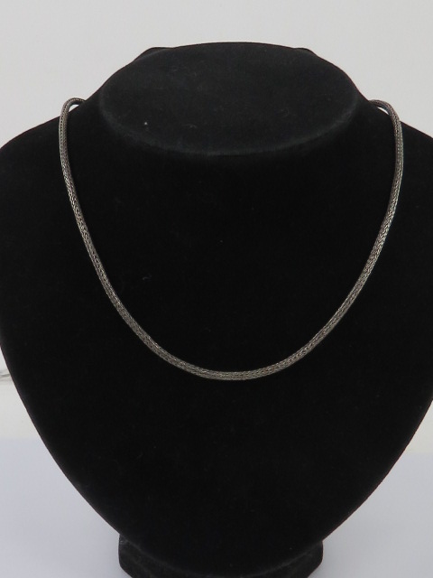 An unusual and substantial silver chain