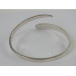 A substantial HM silver bangle - larger