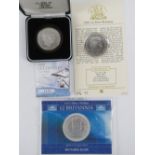 Three 1oz silver proof Britannia coins being 2004, 2006 and 2008, each in protective case.