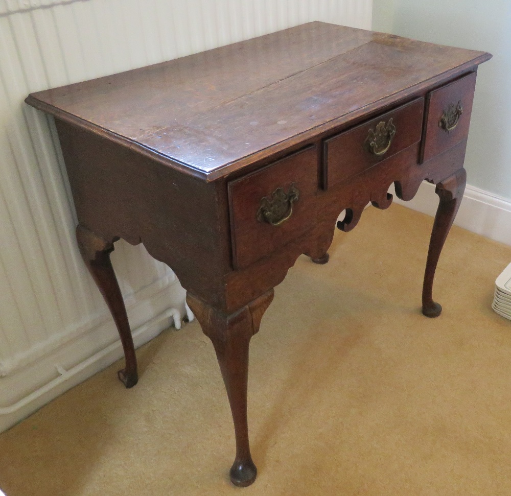 A Georgian low boy, central drawer flanked by twin box drawers, - Image 2 of 3