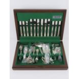 A silver plated cutlery set in original box by Oneida Silversmiths. Engraved with the letter 'B'.