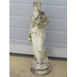 A contemporary stoneware garden figurine in the form of a classical lady, 68cm high.