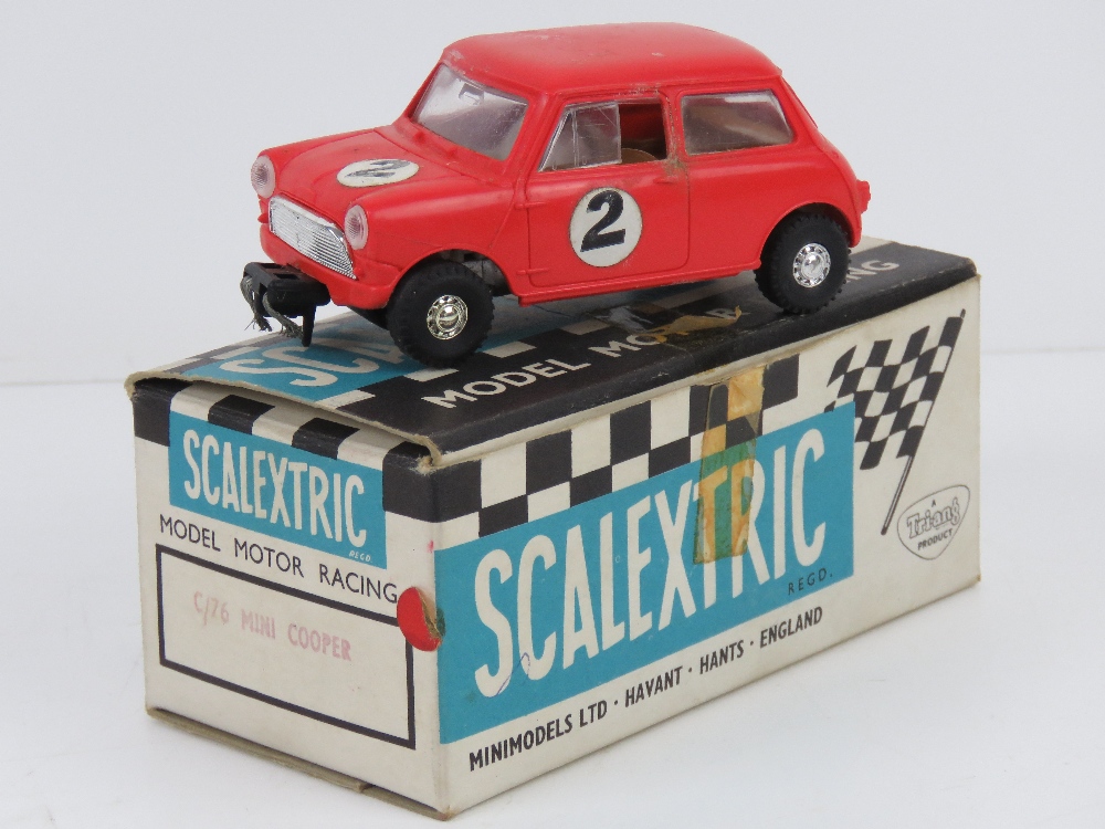 A Triang Scalextric Austin Mini Cooper (C76) in red with original box.