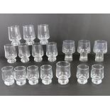 A quantity of assorted contemporary footed glass tumblers.