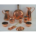 A good clean quantity of assorted copper ware including; jugs, bowls, flagons, crumb scoop,