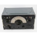 An extraordinarily rare Marconi R1155 Super Heterodyne radio receiver from a WWII Lancaster bomber.