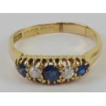 An 18ct gold sapphire and diamond five stone ring,