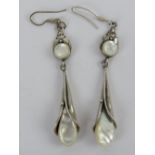 A pair of silver and mother of pearl earrings in the Art Nouveau style, stamped 925, 8cm drop.