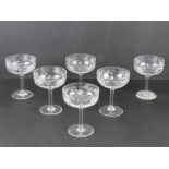 A quantity of six matching champagne saucers.