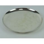 An Art Deco HM silver salver of circular form raised over three feet,