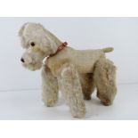 A vintage jointed poodle c1970s.