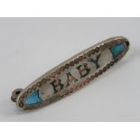 An enamelled Charles Horner 'Baby' Art Nouveau silver brooch,