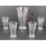 A c1930s lemonade set comprising jug and four matching glasses.