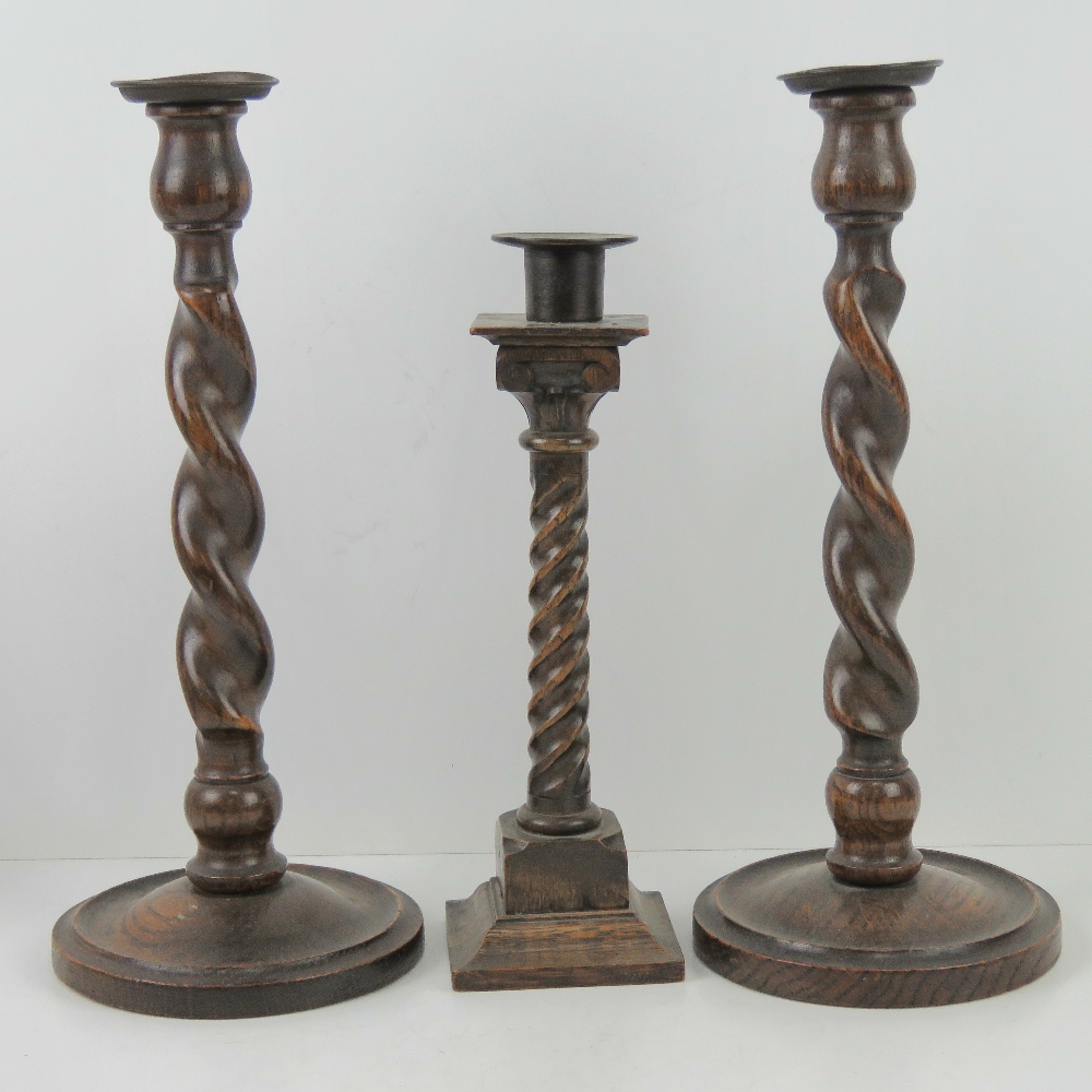 Masonic; a pair of stained oak barley twist altar candlesticks c1930s, 31cm high,