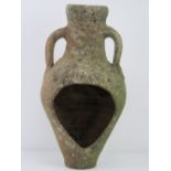 A garden planter in the form of an amphora approx 42cm in length.