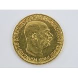 An Austrian Mint 10 Corona 'Franz-Joseph 1912' restrike coin to commemorate the King's 82nd