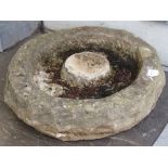 A large carved Cotswold stone floor standing bird bath with central island measuring 54cm in