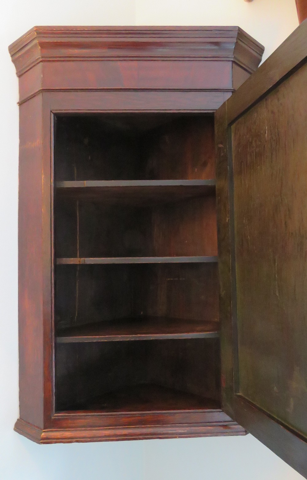 A Georgian oak hanging corner cabinet, door opening to reveal straight cut shelves within, - Image 2 of 2