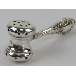 An HM silver rattle in the form of an auctioneer's hammer or gavel hallmarked Birmingham and