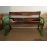 A West Sussex Oak and cast metal framed garden bench, end marked CW,