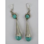 A pair of silver and turquoise earrings in the Art Nouveau style, stamped 925, 8cm drop.