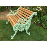 A pair of Victorian Carron Works cast iron garden bench ends, powder coated light mint green,