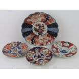 A large 19th century Imari panelled and fluted plate, 31cm dia.