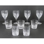 A set of four Stuart crystal wine glasses together with a pair of Stuart crystal whisky tumblers