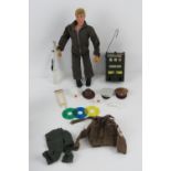 A vintage Action Man made by Palitoy with assorted accessories including; jacket, trousers, hats,