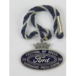 A Festival of Speed Goodwood press centre medallion in blue enamel for Ford 1999.