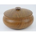 A delightful turned olive wood lidded bowl as made by Ianthe, 21cm wide.