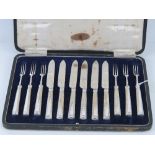 An Art Deco cased set of HM silver handled fruit knives and forks for six settings,