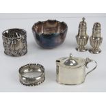 A quantity of assorted HM silver items including pierced napkin ring of ornate foliate design with
