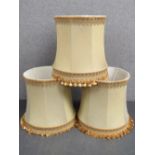 A set of three silk lamp shades approx 39cm dia.