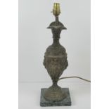 A lamp base in the form of a classical jug having serpentine marble base, slightly a/f.