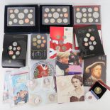A quantity of assorted uncirculated proof coins and coins sets inc Emblems of Britain, 2006, 2007,