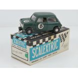 A Triang Scalextric Austin Mini Cooper (C76) in green with original box.