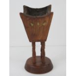 An unusual wooden and brass inlaid censer raised over turned base, 20cm high.