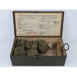A reproduction WWII German Luftschutz First Aid box with medical accessories inc; GEW,