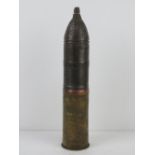 An inert WWII Russian 76mm hollow charge, dated 1944, has Russian writing on shell.