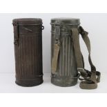Two WWII German gas mask canisters, contents deficient, one having carry straps.